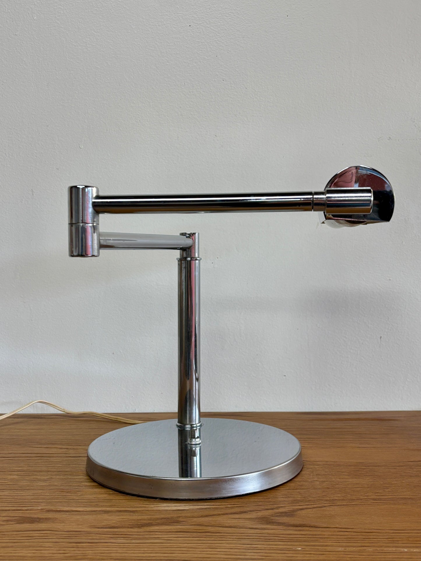 Midcentury chrome swing-arm table lamp by Walter Van Nessen